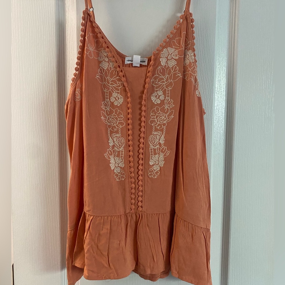 orange flowy tank